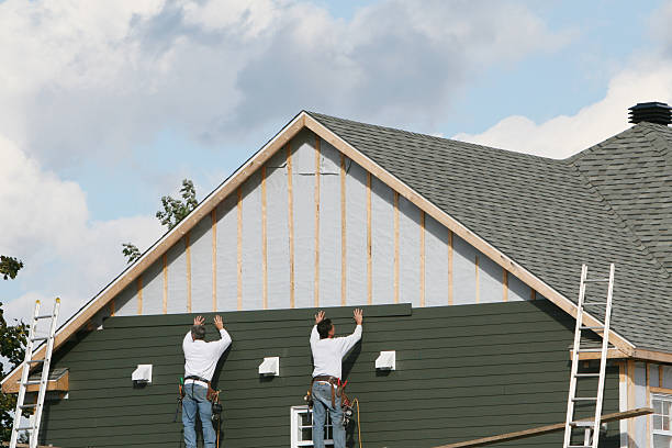 Professional Siding technician working in Baden, PA